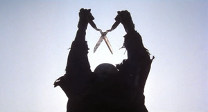 Cropsy raising his shears during the film's raft sequence.