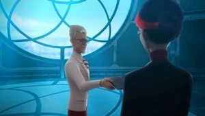 Gabriel handing Nathalie his tablet.