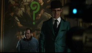 Nygma attempts to get the Court's attention.