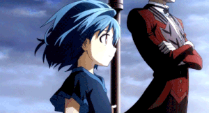 Kohina standing next to her father.