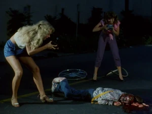 WandaTheToxicAvenger9.jpg (190 KB) Taking photos of her dead victim with Julie, to use later for her personal pleasure