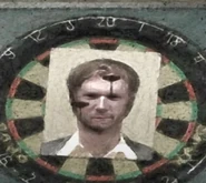Vinnie being used as a dart target.
