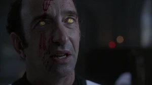 Azazel possessing Father Lehne.