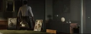 Director Richtofen leaving his office while showing the portraits of him as a Pilot on his jet called The Blue Baron, Him and his wife and son.