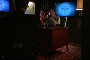 Eiling is visited by Wells at his office.