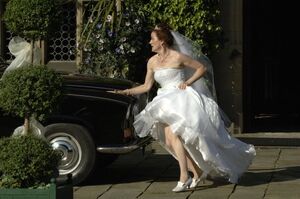 Stella fleeing the church.