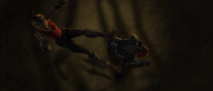 Maul knocks her to the floor by tripping her.