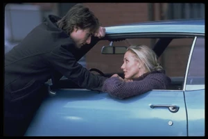 Julie guilting David to come into her car.