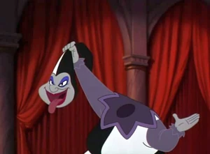 Harlequin holding his head.