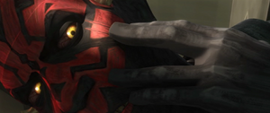 Maul laughing after his face is cut.
