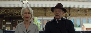 The-good-liar-2019-roy-at-train-station-with-betty.png (686 KB) Roy prepares to part ways with Betty after appearing to succeed in defrauding her £2 million inheritance.