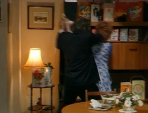 Alan begins lashing out at Rita as she goes to answer a phone call.