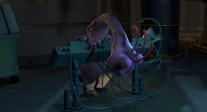 Randall looks down at the cords.