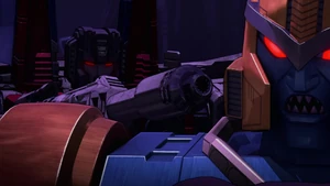 Starscream sneaks up behind Dinobot.