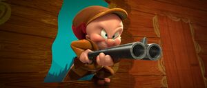 Elmer wielding his gun in "Daffy's Rhapsody".