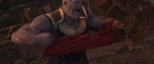 Thanos tears the Cloak off the Gauntlet.