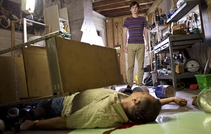 Norman finds his dad's dead body.