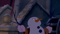 LeFou posing as a snowman as he witnessed Belle and Maurice's return.