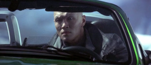 Zao pursues Bond by car.