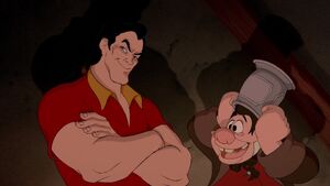 Gaston and LeFou making a deal with D'Arque.