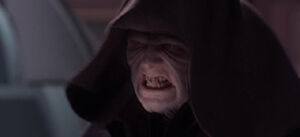 Palpatine laughing manically at Yoda.