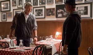 Drago confronting Rocky in the latter's restaurant 33 years later for defeating him.