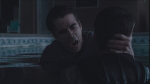 Jerry biting Ed and turning him into a vampire.