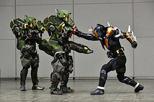 A duo of Hard Guardians fighting Kamen Rider Cross-Z.