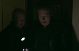 Phil Mitchell executes his armed robbery with Dirty Den.