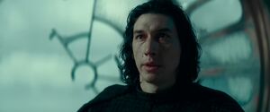 Kylo looking at Rey as she angrily demands him to give her the wayfinder.