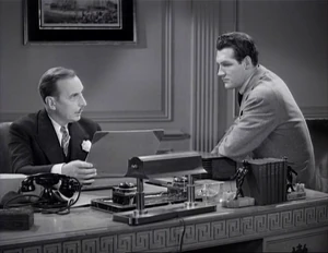 Grover commending Fred on his work on the books