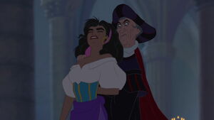 Frollo sneaks up behind Esmeralda and forcefully grabs her arm.