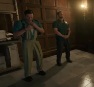 Two Luttazzi Security Guards standing.