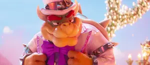 Bowser smiling as Princess Peach walks down the aisle.