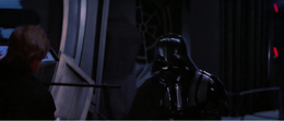 Within the darkened confines of the Emperor's throne room, Luke engaged his father in a fierce lightsaber duel.