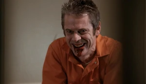 Foyet smiling sadistically just before he escapes from prison.