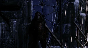 A Dwerger on scaffolding turns around and comes face-to-face with Van Helsing.