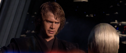 Anakin hesitates to kill his nemesis and behead Dooku.