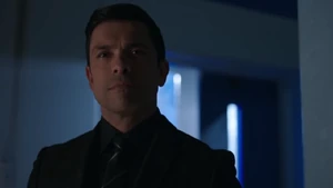 Hiram sadistically watching Archie being arrested.
