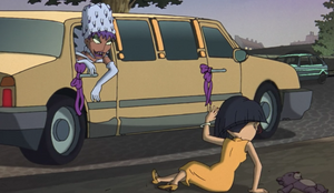 Coco kicking Kira out of the limo.