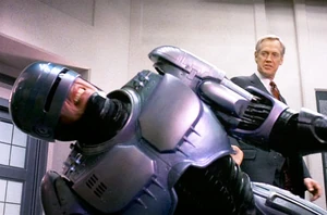 Dick explaining Directive 4 to RoboCop after he tried to arrest him.