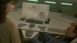 Wilson and Emmi observing King Ghidorah's rampage.