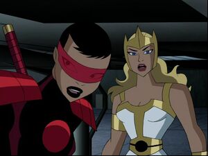 Aresia and Tsukuri, surprised by Wonder Woman and Hawkgirl's arrival.