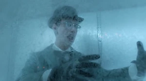 Nygma is frozen solid by Mr. Freeze.