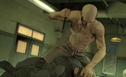 Zsasz having the upper hand on Batman.