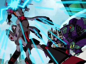 Megatron offlining Starscream with the AllSpark Key.