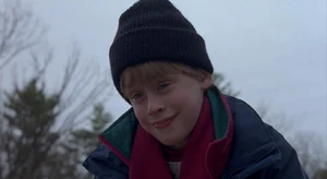 Henry's evil grin, watching the car accident that he had caused while Mark watches in horror.