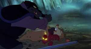 Jenner attacking Mrs. Brisby for her magic necklace.