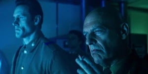 Grigori and his superior, Stepanov watching two scientists activate a machine called a "Key" to open a portal to another dimension.