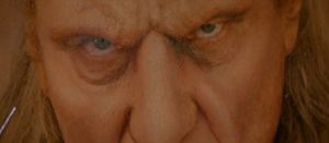 Vigo's eyes hide behind the evil painting.